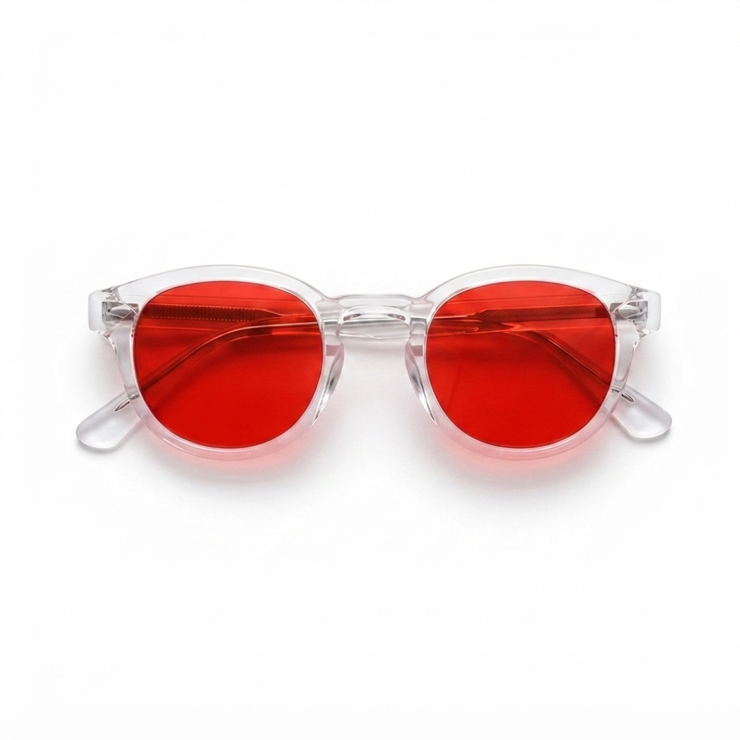 Round sunglasses with translucent clear frames and vibrant red lenses, shown on a plain white background.