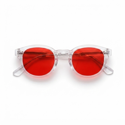 Round sunglasses with translucent clear frames and vibrant red lenses, shown on a plain white background.