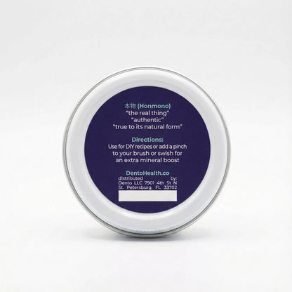 Hydroxyapatite Powder — product photo on a white background, side view.