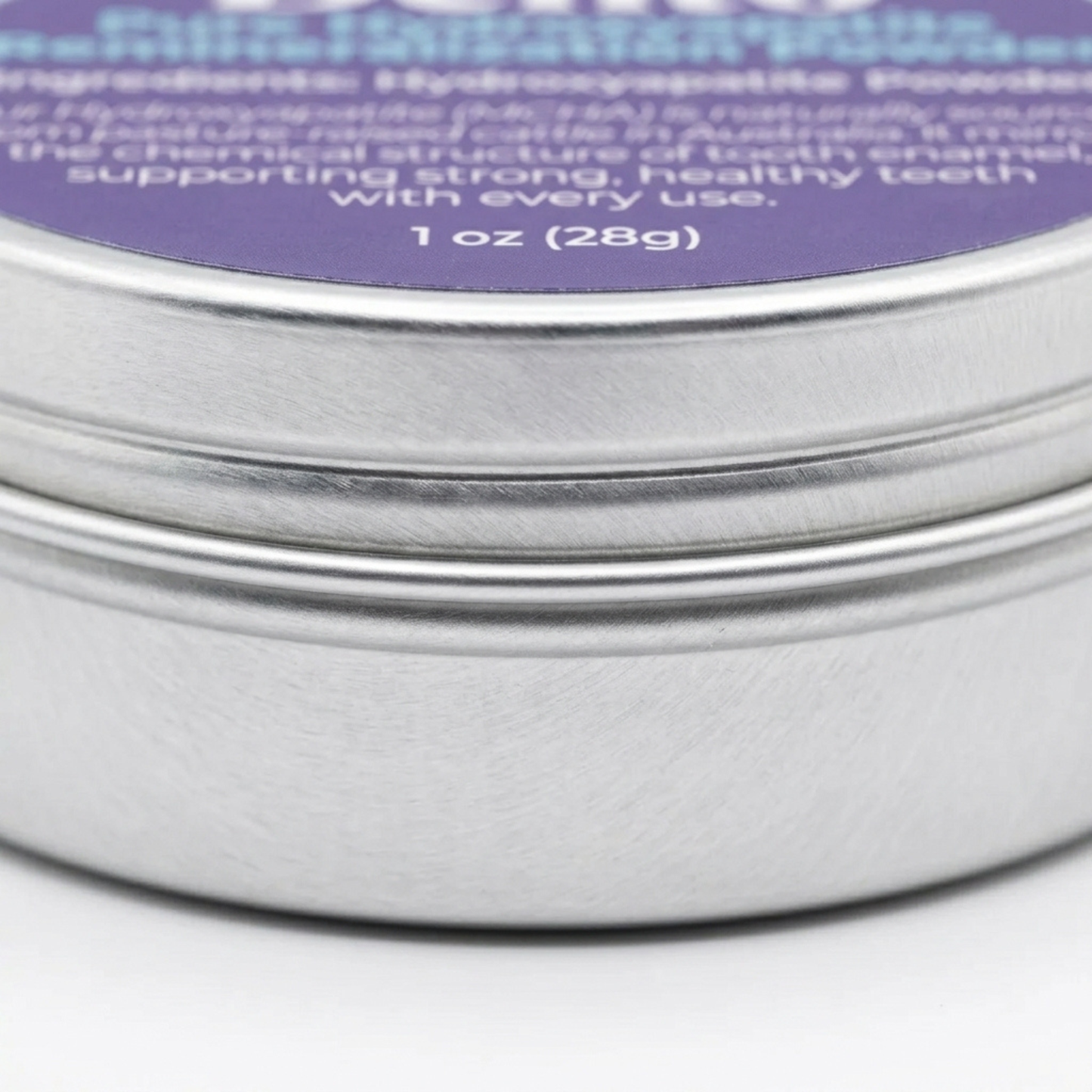 Close-up side view of the Dentō Hydroxyapatite Powder jar and label.