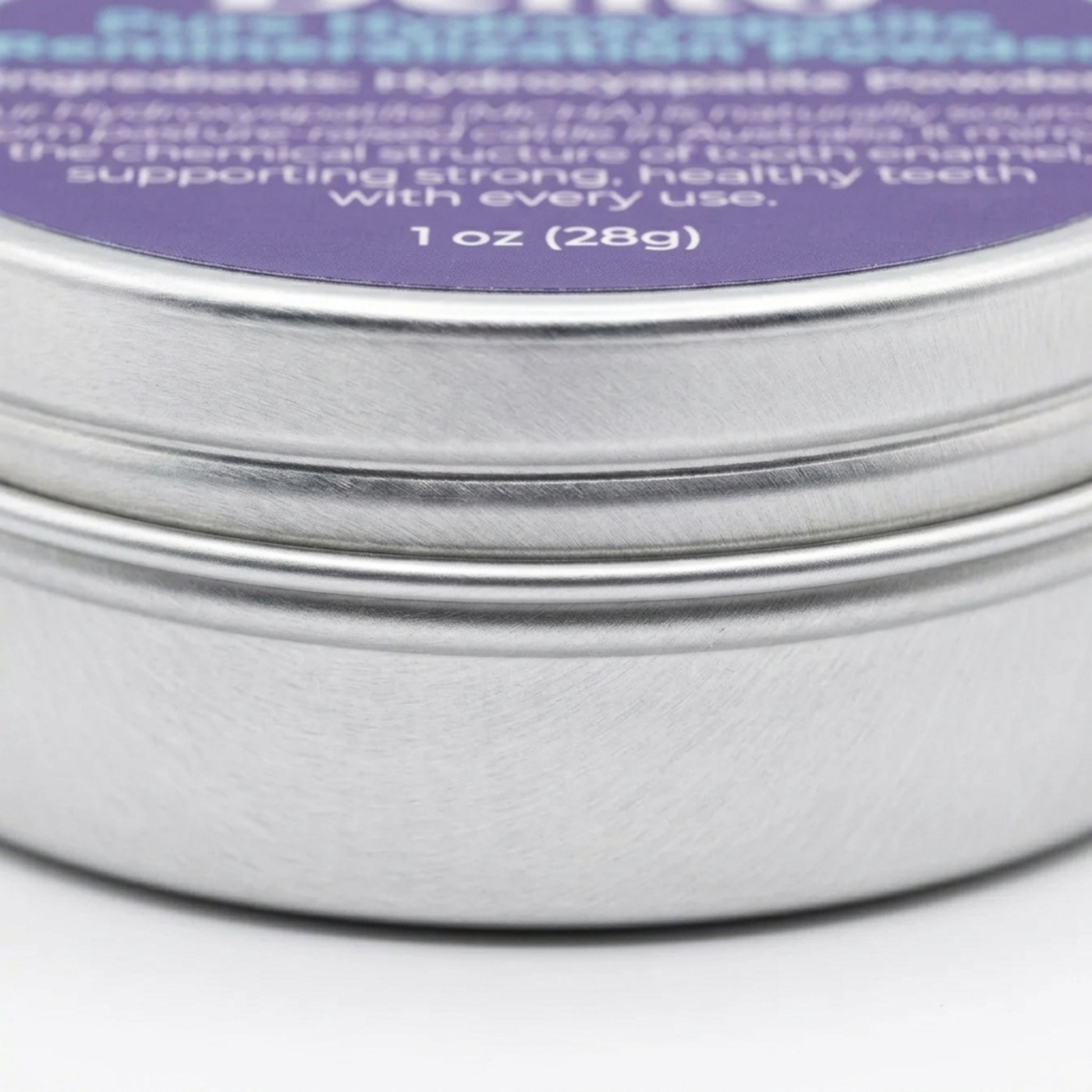 Close-up side view of the Dentō Hydroxyapatite Powder jar and label.