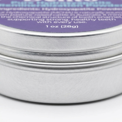 Close-up side view of the Dentō Hydroxyapatite Powder jar and label.