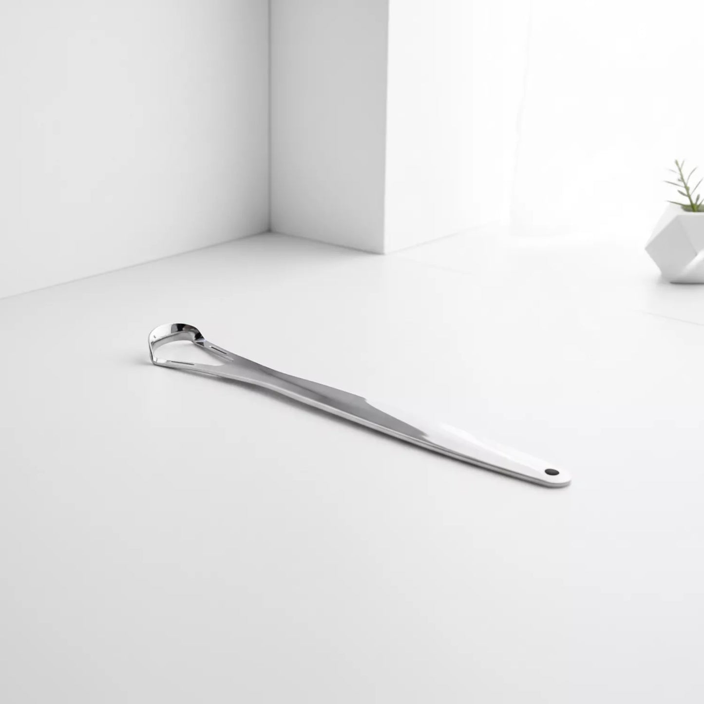 Tongue Scraper — wholesale case packs, product photo on a white background, close-up view.