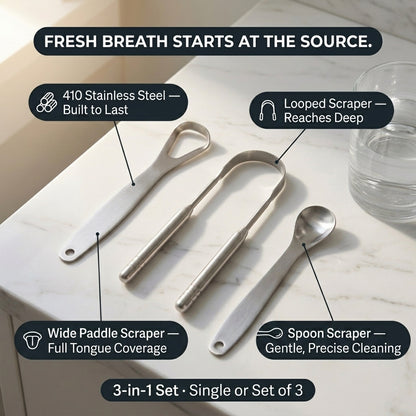 Three stainless steel oral scrubs and a spoon are arranged on a light marble surface with callout text describing features: 410 stainless steel, looped scraper reaching deep, wide paddle scraper with full tongue coverage, and spoon scraper gentle and precise cleaning.