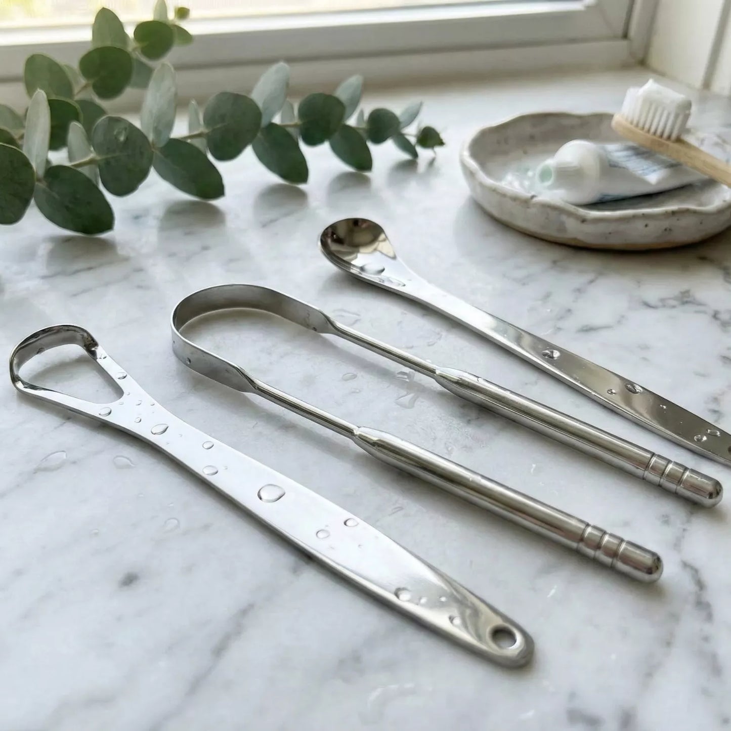 Tongue Scraper — wholesale case packs, product photo on a white background.