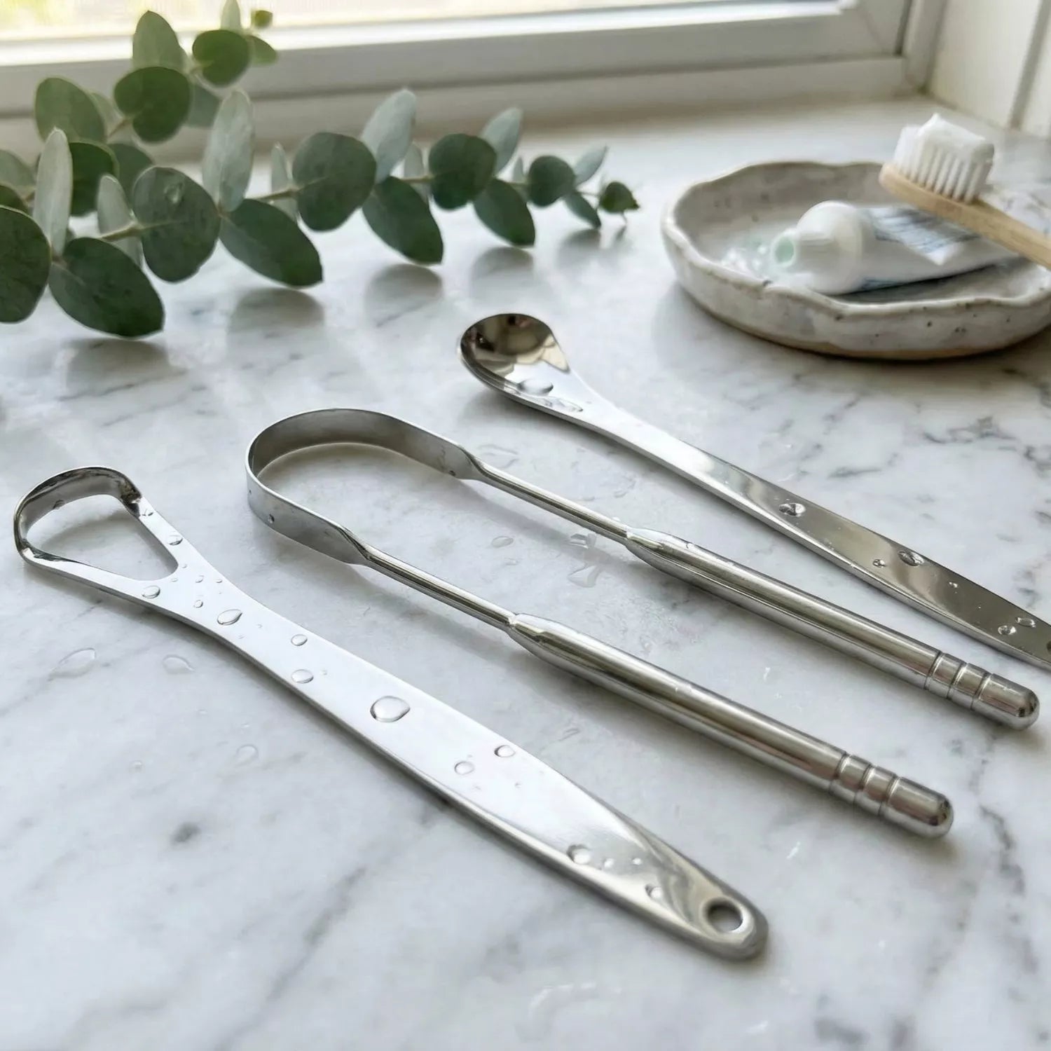 Tongue Scraper — wholesale case packs, product photo on a white background.