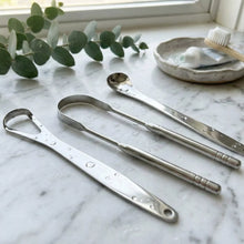 Tongue Scraper — wholesale case packs, product photo on a white background.