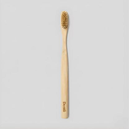 Boar Bristle Toothbrush — wholesale case packs, product photo on a white background, single brush shown.