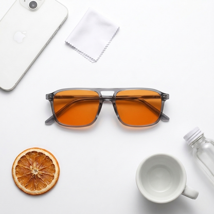 Blue Light Blocking Glasses — Atlas, Orange Lens, product photo on a white background, close-up view.