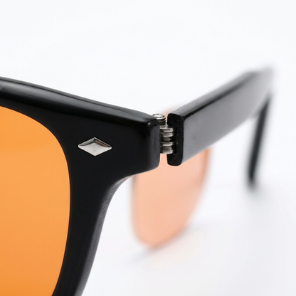 Blue Light Blocking Glasses — Dawn, Orange Lens, side view product photo on a white background.