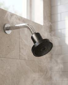 Shower Head Filter, Black finish, lifestyle photo showing the product in use.